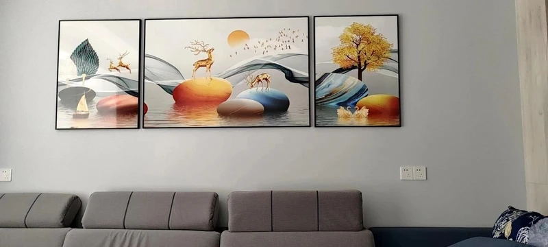 Mang may mắn nhờ tranh treo phòng khách phong thủy